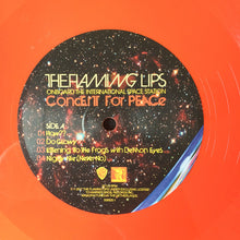 Load image into Gallery viewer, THE FLAMING LIPS - ONBOARD THE INTERNATIONAL SPACE STATION: CONCE ( 12" RECORD )