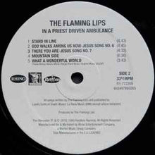 Load image into Gallery viewer, The Flaming Lips – In A Priest Driven Ambulance