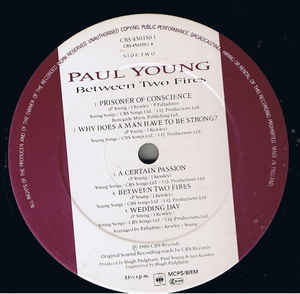 Paul Young ‎– Between Two Fires